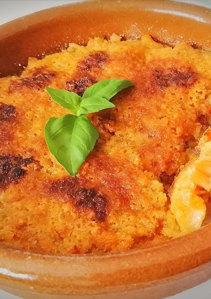 Una foto de Langostinos y palitos de Cangrejo a la Donostiarra