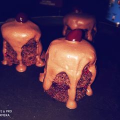 Dutch Mini Cocoa cakes with spicy cherry spread and Ganache A picture of Dutch Mini Cocoa cakes with spicy cherry spread and Ganache.