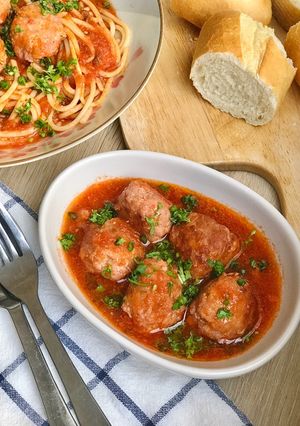 A picture of Pork Meatballs in Tomato Sauce (Xiu Mai).