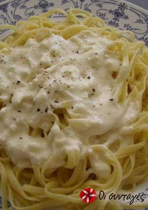 A picture of Spaghetti with feta cheese.