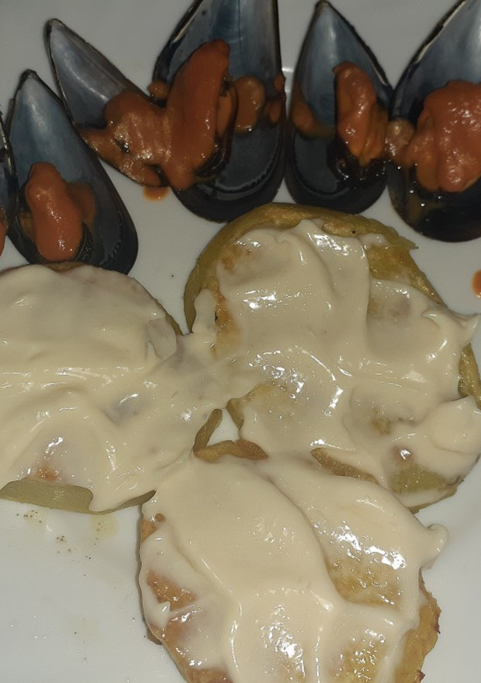 Una foto de Mejillones picantes con patatas a la inglesa