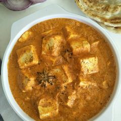 A picture of Paneer Makhani (Cottage Cheese In A Creamy Tomato Gravy).