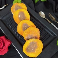 A picture of Stuffed Chocolate Mango Kulfi.