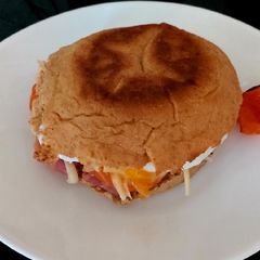 A picture of My Bacon,Tom,Cheese+Poached Egg Muffin 🥰#Breakfast.