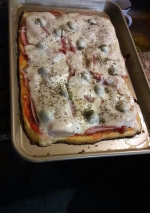 Una foto de Pizza de masa de coliflor