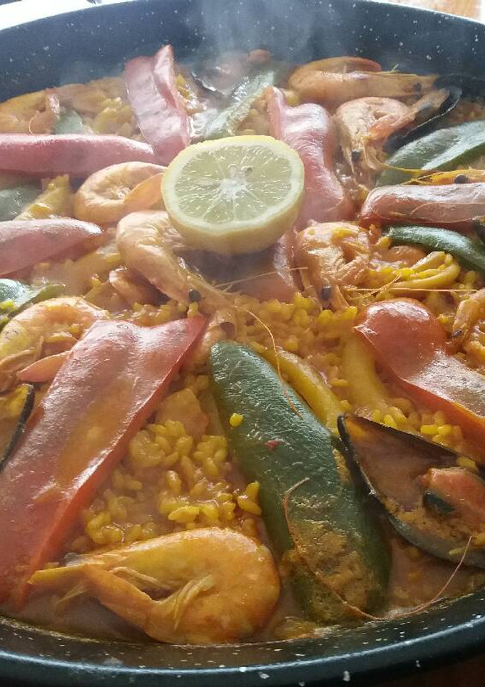 Una foto de Paella de marisco