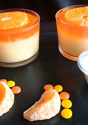 A picture of Milky vanilla curd with Orange jelly.
