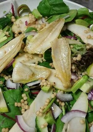 A picture of Pear and pearl cous cous salad w' baby fish fillets.