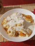 Raviolis rellenos de calabaza con crema de grana padano