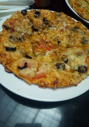 A picture of Cheesy tasty pizza.
