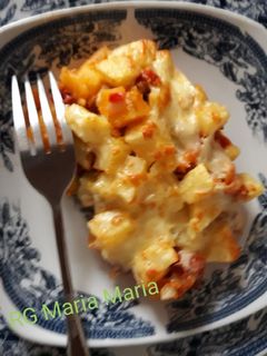 صورة لوصفة غراتان خضار وتونة 🐟🥕🧀