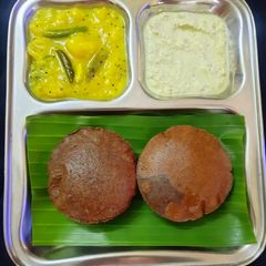 A picture of Manipuri Chak hao tal / black rice poori.