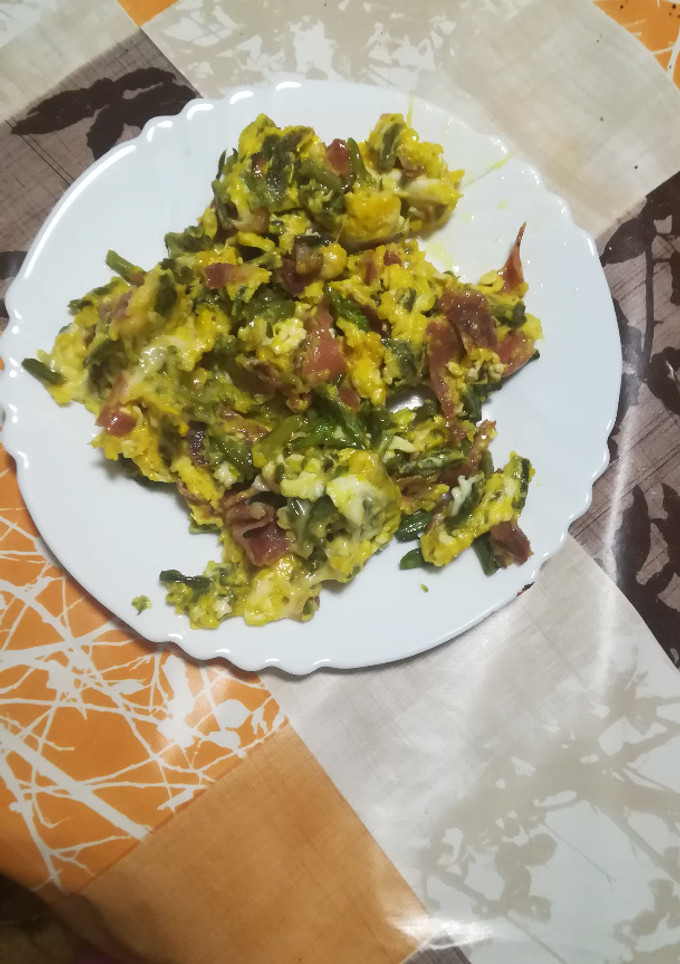 Una foto de Revueltos de trigeros con jamón y 4 quesos
