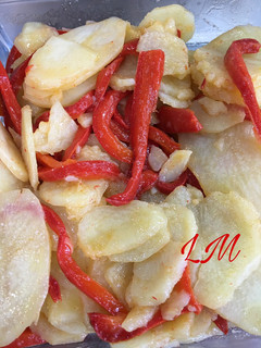 Una foto de Patatas panaderas con pimientos en Thermomix