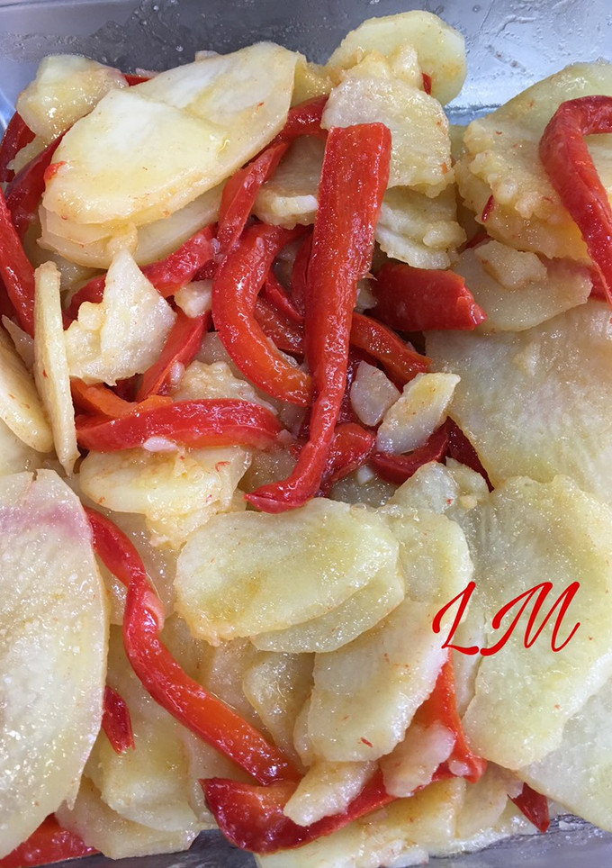 Una foto de Patatas panaderas con pimientos en Thermomix