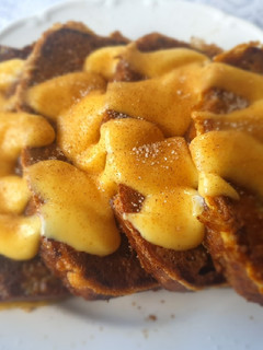 A picture of Breakfast pudding, Banana bread french toast and custard.