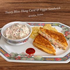 A picture of Toasty Bliss: Hung Curd & Veggie Sandwich.