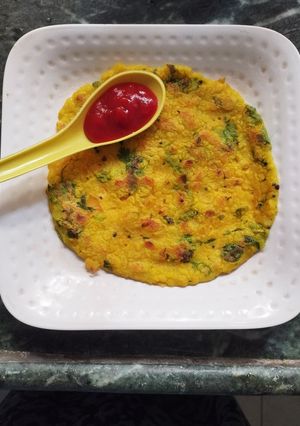 A picture of Leftover poha chilla.