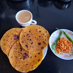 A picture of Thepla with Tea.