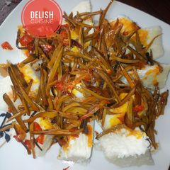 A picture of Boiled yam and ugba sauce (African oil-bean seed).