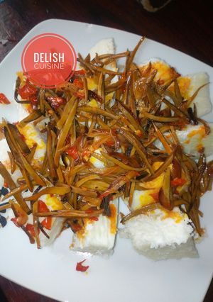 A picture of Boiled yam and ugba sauce (African oil-bean seed).