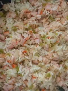 Una foto de Arroz con cerdo adobado