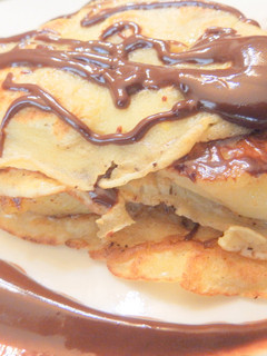 Una foto de Creps de naranja con plátano y chocolate