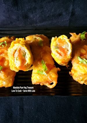 A picture of Potato Stuffed Onion Bread Roll Fritters - Aloo Pyaz Bread Roll Pakore.