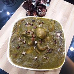 A picture of Spicy spinach mushrooms.
