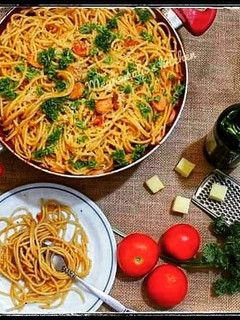 A picture of Spaghetti in tomato sauce.
