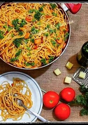 A picture of Spaghetti in tomato sauce.