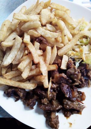 A picture of Chips and wetfried beef.
