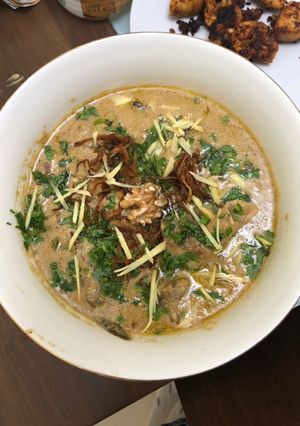 A picture of Adraki akhroti mutton(Mutton curry with ginger and walnut).