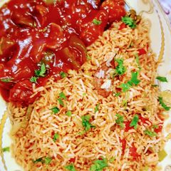 Chicken Manchurian with vegetable rice A picture of Chicken Manchurian with vegetable rice.