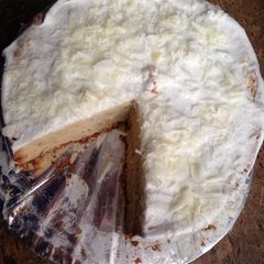 A picture of White semi naked cake.