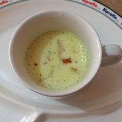 A picture of Milk with dry fruit.