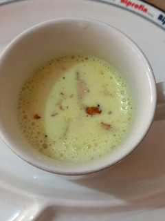 A picture of Milk with dry fruit.