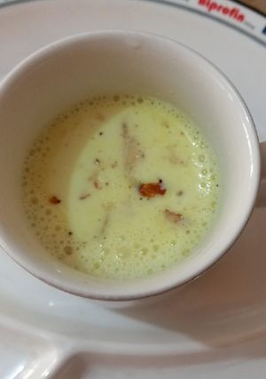 A picture of Milk with dry fruit.