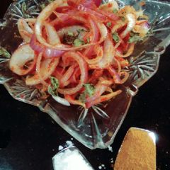 A picture of Lacha onion salad.