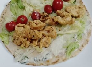 Una foto de Wrap de pollo (pan pita)