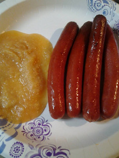 A picture of Hotdogs with applesauce.