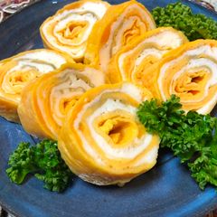 Japanese white and yellow Egg Roll A picture of Japanese white and yellow Egg Roll.