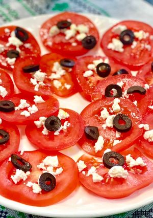 Une photo de Carpaccio de tomates