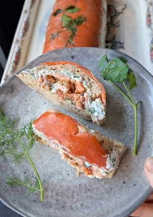 A picture of Two-Salmon Loaf with Fresh Herb and Cucumber Sauce.