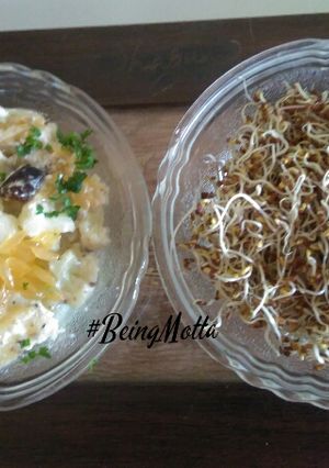 A picture of Fruits & vegetable salad with alfalfa sprouts.