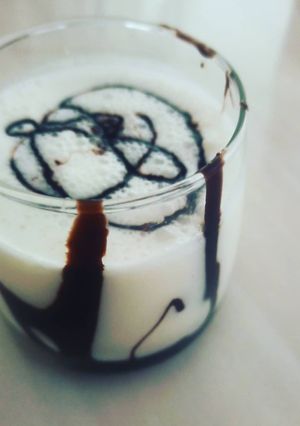 A picture of Chocolate syrup Dahi lassi.