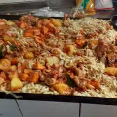 Una foto de Tallarines con salsa de pollo al disco