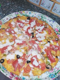صورة لوصفة بيتزا 🍕