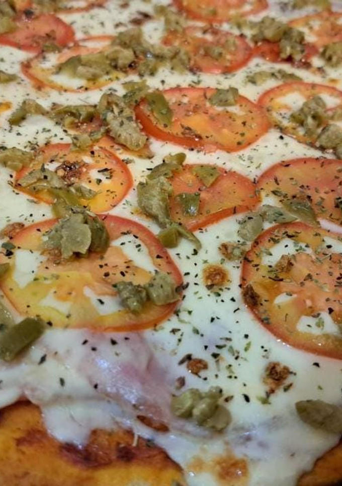Una foto de Masa para pizza casera estilo EEUU