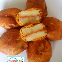 Garlic Chutney Potato Fritters - Lasooni Aloo Pakore A picture of Garlic Chutney Potato Fritters - Lasooni Aloo Pakore.
